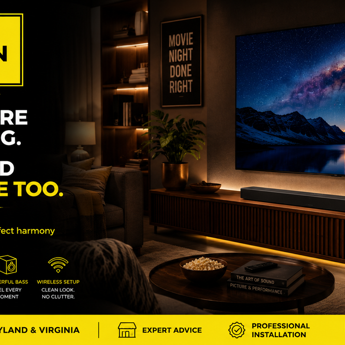 Samsung soundbar displayed below a Samsung TV in a home theater showroom